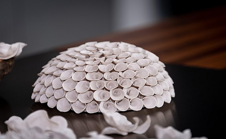Porcelain flowers on table